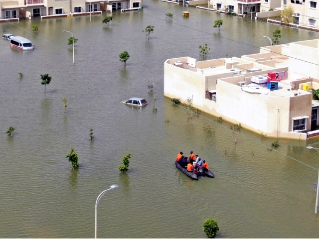 pakistan navy team rescues distressed people in rain hit area of karachi photo pakistan navy