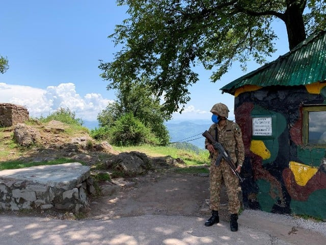 army soldier stands guard at a hilltop post during a trip organised by the army near the line of control loc in charikot sector azad kashmir july 22 2020 photo reuters file army soldier stands guard at a hilltop post during a trip organised by the army near the line of control loc in charikot sector azad kashmir july 22 2020 photo reuters file