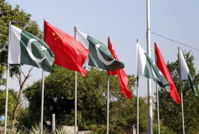 pakistani national flags and chinese national flags are raised by an avenue in islamabad oct 1 2023 photo xinhua