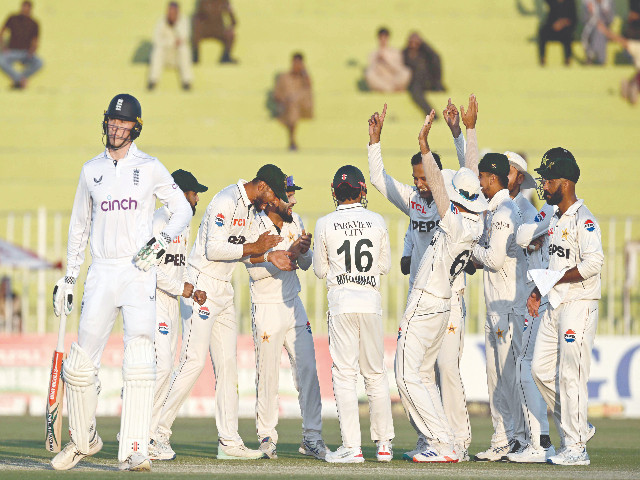 pakistan players celebrate after the dismissal of england s zak crawley l on second day of the third test at rawalpindi on friday photo afp