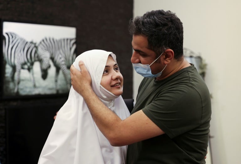 pakistani pilgrim bushra shah bids her husband farewell before leaving for the hajj    the first time she can do so without a mehram photo afp
