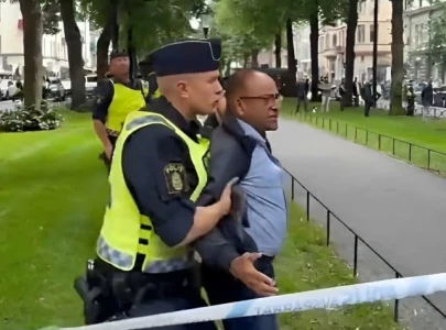 police block pakistani man from preventing holy quran burning in stockholm police block pakistani man from preventing holy quran burning in stockholm