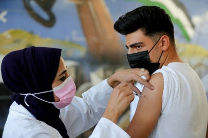 covid vaccine mandates   and prizes   boost uptake among palestinians