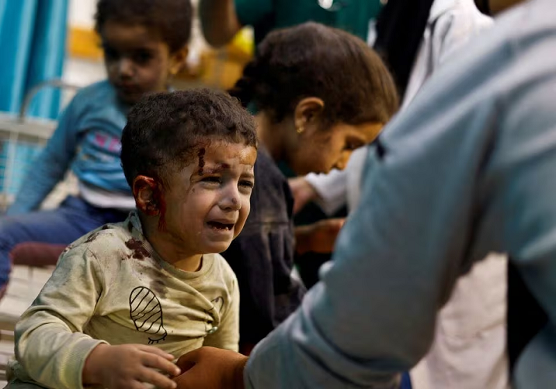 palestinian children wounded in israeli strikes wait for treatment at nasser hospital in khan younis in the southern gaza strip november 12 2023 photo reuters