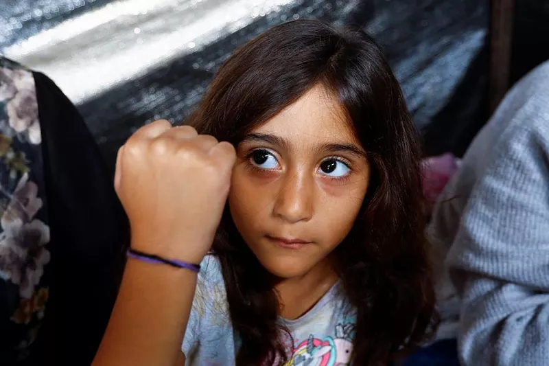 gaza families wear id bracelets to avoid burial in mass graves gaza families wear id bracelets to avoid burial in mass graves