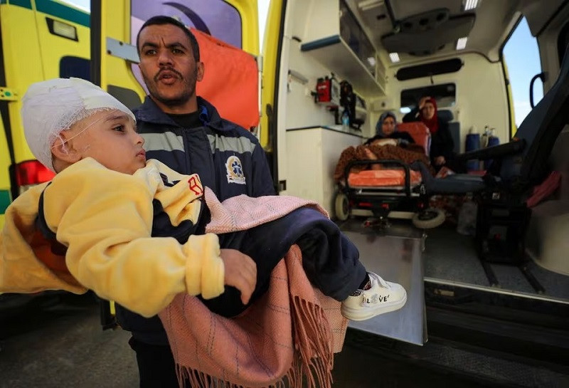Injured Palestinian child, Jumana Mahmoud, is evacuated for diagnosis in Qatar during Al Arish Airport, Egypt, Feb 1, 2024. PHOTO: REUTERS
