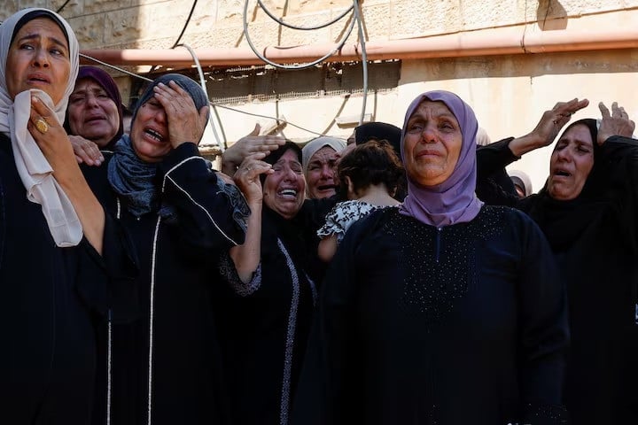 mourners react during the funeral of three palestinians in aqaba near tubas in the israeli occupied west bank august 6 2024 photo reuters
