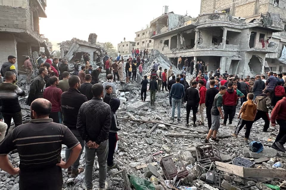 palestinians gather at the site of an israeli strike on a house in jabalia in the northern gaza strip on november 10 2024 photo reuters