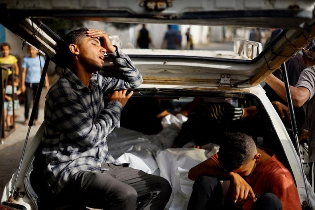 mourners react next to the bodies of palestinians killed in an israeli strike in rafah in the southern gaza strip may 27 2024 photo reuters mourners react next to the bodies of palestinians killed in an israeli strike in rafah in the southern gaza strip may 27 2024 photo reuters