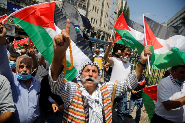 palestinians take part in a protest against the united arab emirates deal with israel to normalise relations in nablus in the israeli occupied west bank august 14 2020 photo reuters