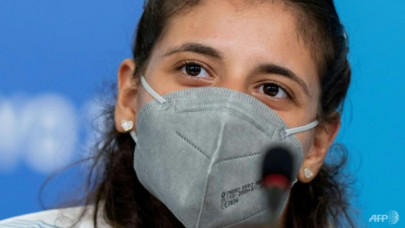 first woman on paralympic refugee team urges others to try sport