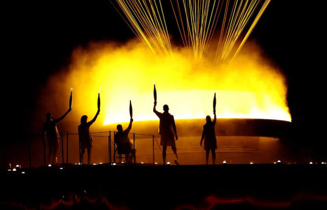 charles antoine kouakou nantenin keita fabien lamirault alexis hanquinquant and elodie lorandi lit the olympic cauldron during paris 2024 paralympics opening ceremony in paris france on august 28 2024 photo reuters charles antoine kouakou nantenin keita fabien lamirault alexis hanquinquant and elodie lorandi lit the olympic cauldron during paris 2024 paralympics opening ceremony in paris france on august 28 2024 photo reuters