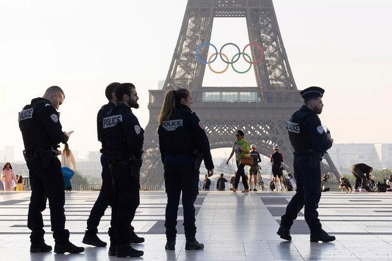 En garde: 45,000 security personnel will be on duty for the Olympic opening ceremony along the Seine. PHOTO: AFP