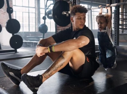 patrick mahomes is a proud dad after daughter sterling sleeps next to basketball