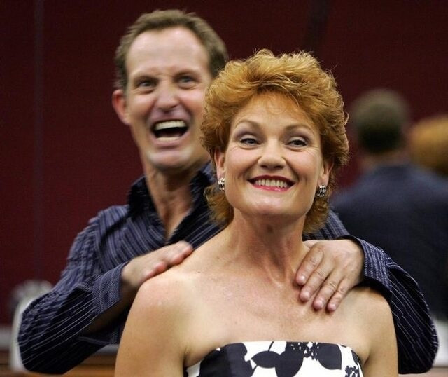 australia entertainer mckenney pretends to strangle former australian political firebrand pauline hanson in sydney photo reuters