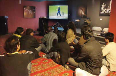 live and alive where watching cricket and listening to music blend