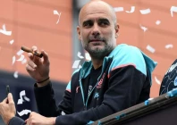 catching up manchester city manager pep guardiola is celebrating fourth consecutive premier league title photo afp