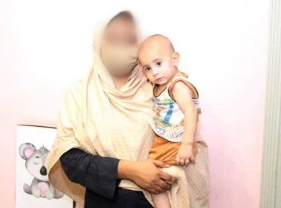 infant taken from quetta reunited with family in peshawar