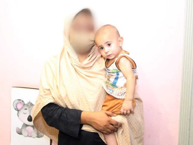 infant taken from quetta reunited with family in peshawar