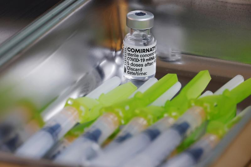 doses of the pfizer biontech coronavirus disease covid 19 vaccine are seen at a covid 19 vaccination centre photo reuters file