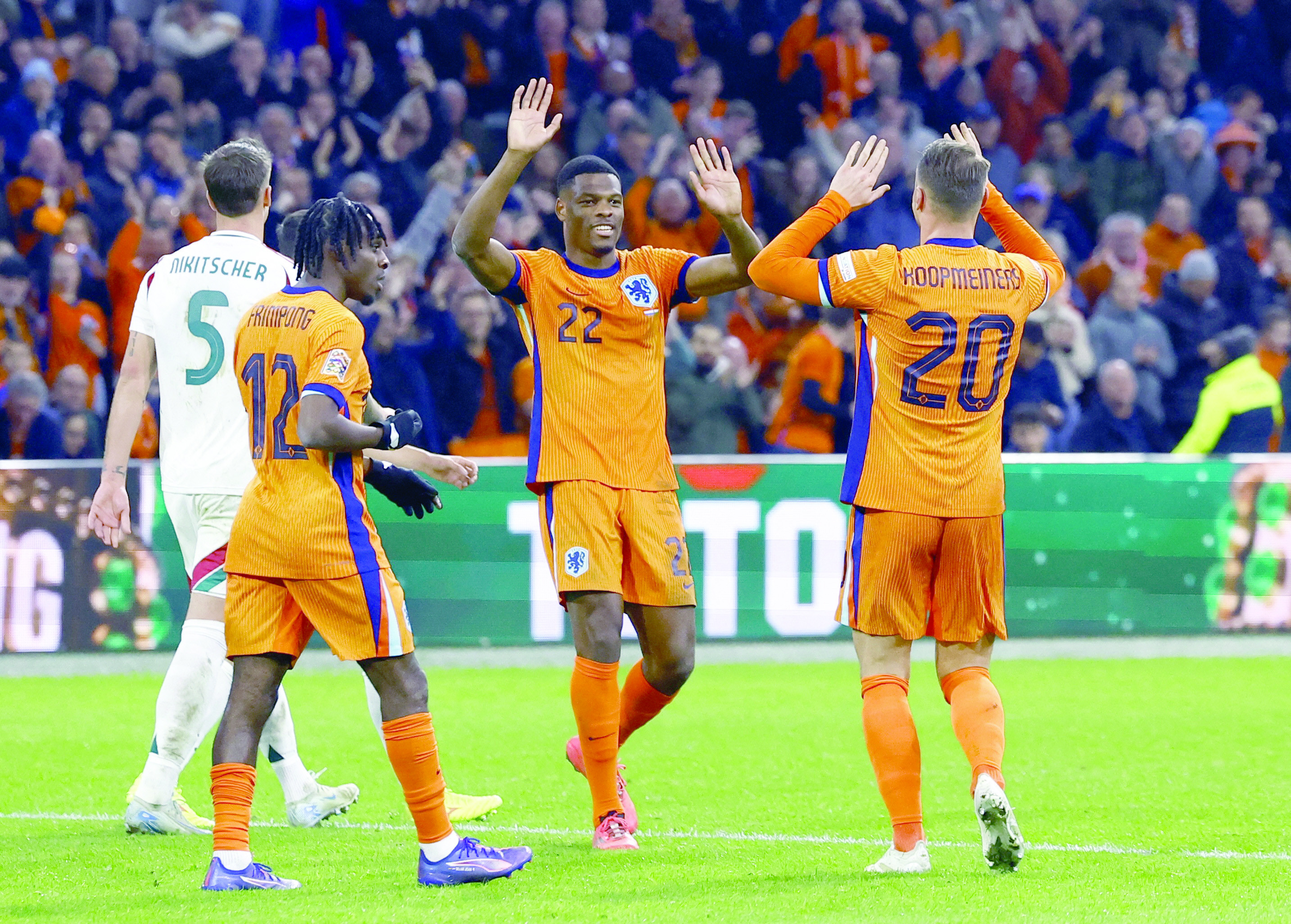 netherlands teun koopmeiners celebrates scoring their fourth goal with denzel dumfries against hungary at johan cruyff arena amsterdam photo reuters