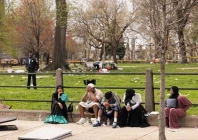 people sit on the edge of clara muhammad square after an eid celebration was broken up by a shooting in philadelphia pennsylvania photo afp