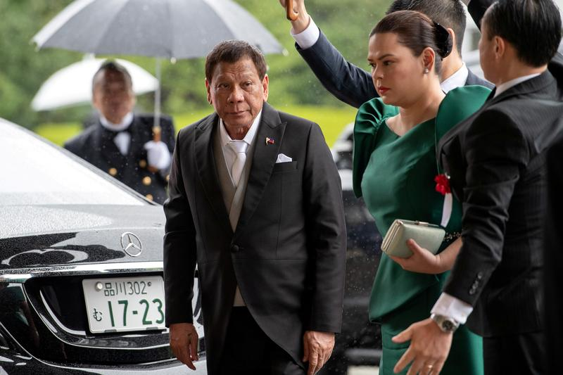 philippines president rodrigo duterte arrives with daughter and first lady sara duterte carpio to attend the enthronement ceremony of japan s emperor naruhito in tokyo japan october 22 2019 photo reuters