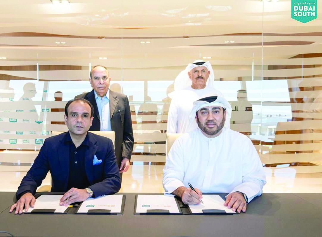 executive chairman of dubai aviation city corporation and dubai south he khalifa al zaffin group chief executive officer ahmed ali riaz malik ceo of dubai south properties nabil al kindi and founder and chairman of bahria town malik riaz hussain pose during the agreement signing ceremony photo courtesy government of dubai media office