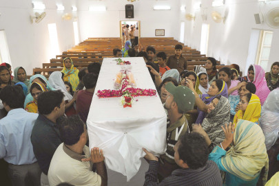 scores of bodies arrive home to grieving families friends scores of bodies arrive home to grieving families friends