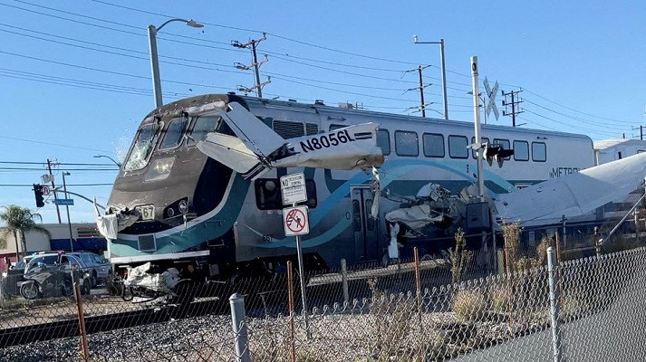 a train hits an aircraft that crashed on railway tracks in los angeles california us january 9 2022 in this screen grab from a social media video obtained by reuters photo reuters