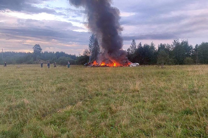 This photograph posted on a Wagner linked Telegram channel @grey_zone on August 23, 2023 , reportedly shows a the wreckage of burning plane near the village of Kuzhenkino, Tver region. PHOTO: AFP