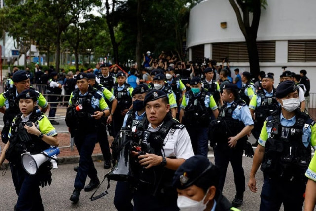 police stand guard outside the west kowloon magistrates courts building in hong kong china may 30 2024 photo reuters police stand guard outside the west kowloon magistrates courts building in hong kong china may 30 2024 photo reuters