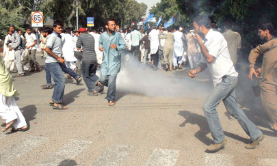 police tear gas protest rally for aafia near metropole