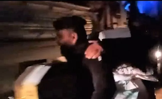 a still image of a video wherein police officials are seen taking away ration bags meant for the dadu inferno victims a still image of a video wherein police officials are seen taking away ration bags meant for the dadu inferno victims