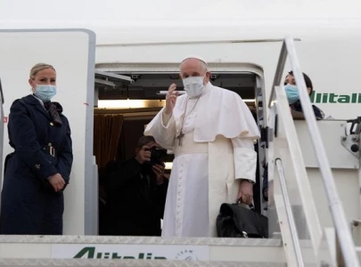 pope francis arrives in baghdad for risky historic iraq tour