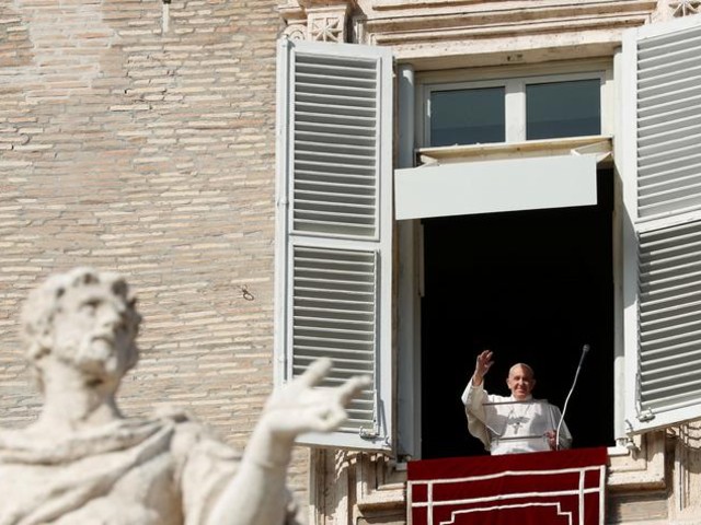 pope francis waves his hand during the angelus prayer held from a window at saint peter s square vatican october 25 2020 photo reuters