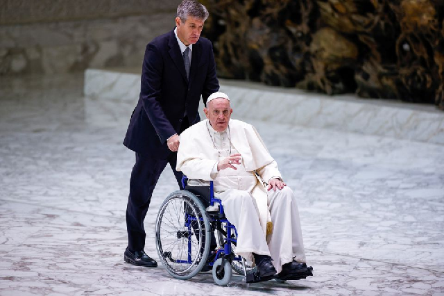 pope francis arrives on a wheelchair to meet with participants in the plenary assembly of the international union of superiors general iusg at the vatican may 5 2022 photo reuters