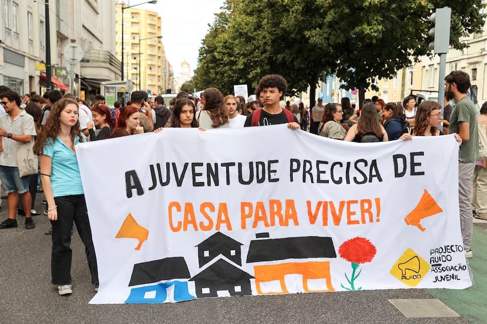 people hold a banner reading youths need houses to live during a demonstration against the housing crisis in lisbon portugal on september 28 2024 photo reuters