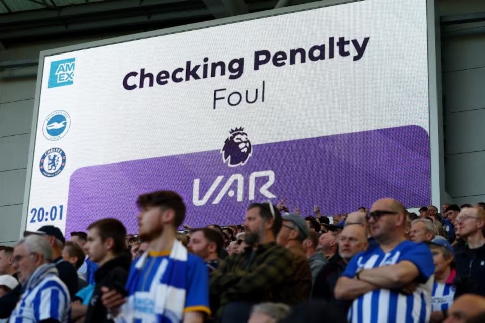 general view of the big screen during a var review before a penalty is overturned during premier league s brighton hove albion vs chelsea match at american express community stadium brighton britain on may 15 2024 photo reuters