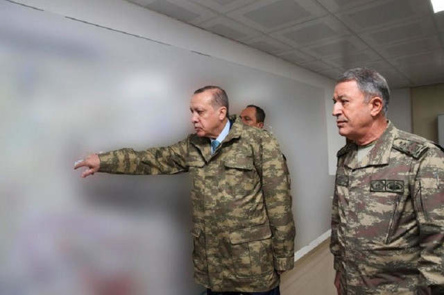 turkey s president recep tayyip erdogan l during a briefing led by chief of the general staff of the turkish armed forces hulusi at the operating base in hatay january 25 photo afp turkey s president recep tayyip erdogan l during a briefing led by chief of the general staff of the turkish armed forces hulusi at the operating base in hatay january 25 photo afp