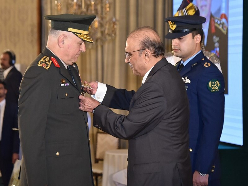 president zaradari confers nishan e imtiaz on gen metin gurak the turkish chief of general staff at the president house in islamabad photo app