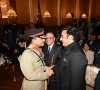 coas gen asim munir shakes hand with bilawal bhutto zardari as asif zardari smiles in the background photo express