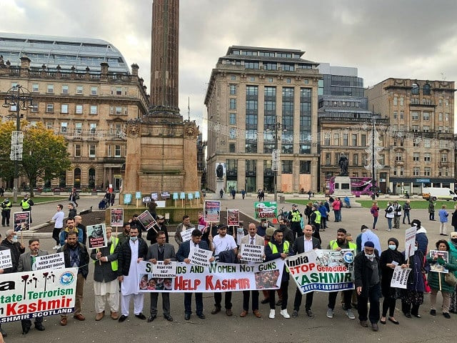the picture shows participants of a protest against indian atrocities in occupied kashmir during indian prime minister narendra modi s arrival to attend the cop26 summit in glasgow on nov 2 2021 photo express the picture shows participants of a protest against indian atrocities in occupied kashmir during indian prime minister narendra modi s arrival to attend the cop26 summit in glasgow on nov 2 2021 photo express