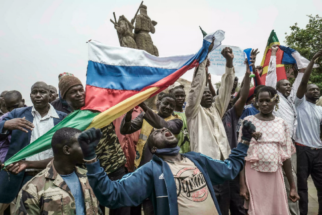 protesters in malian capital bamako often wave russian flags during demonstrations against french influence photo afp file protesters in malian capital bamako often wave russian flags during demonstrations against french influence photo afp file