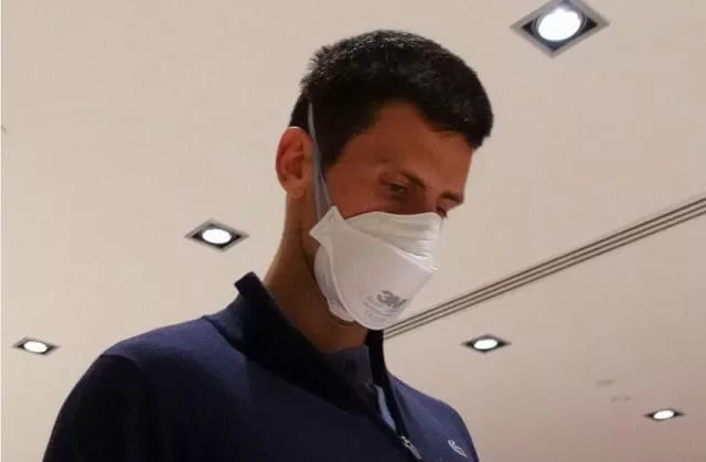 serbian tennis player novak djokovic walks in melbourne airport before boarding a flight after the federal court upheld a government decision to cancel his visa to play in the australian open in melbourne australia january 16 2022 photo reuters serbian tennis player novak djokovic walks in melbourne airport before boarding a flight after the federal court upheld a government decision to cancel his visa to play in the australian open in melbourne australia january 16 2022 photo reuters