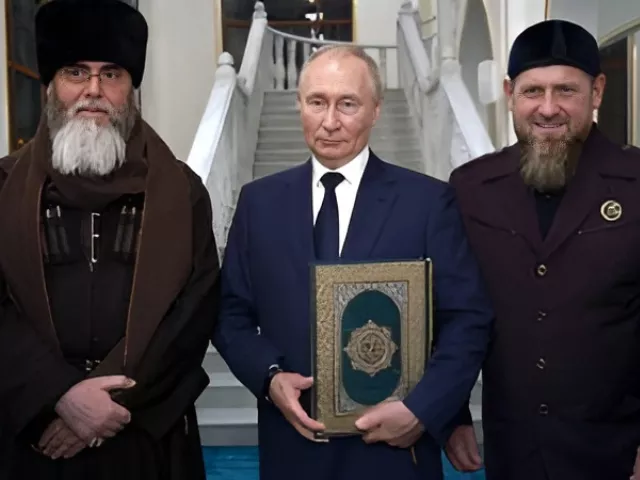 at the mosque the russian president was presented with a rare edition of the quran which he kissed out of respect and held to his chest screengrab at the mosque the russian president was presented with a rare edition of the quran which he kissed out of respect and held to his chest screengrab