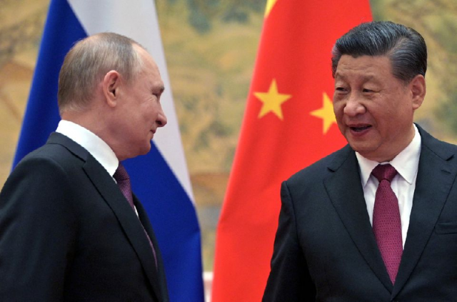 russian president vladimir putin attends a meeting with chinese president xi jinping in beijing china february 4 2022 photo reuters russian president vladimir putin attends a meeting with chinese president xi jinping in beijing china february 4 2022 photo reuters