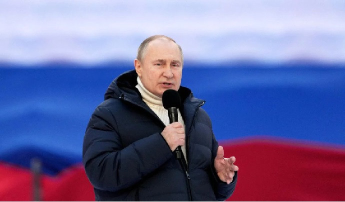 russian president vladimir putin delivers a speech during a concert marking the eighth anniversary of russia s annexation of crimea at luzhniki stadium in moscow russia march 18 2022 photo reuters