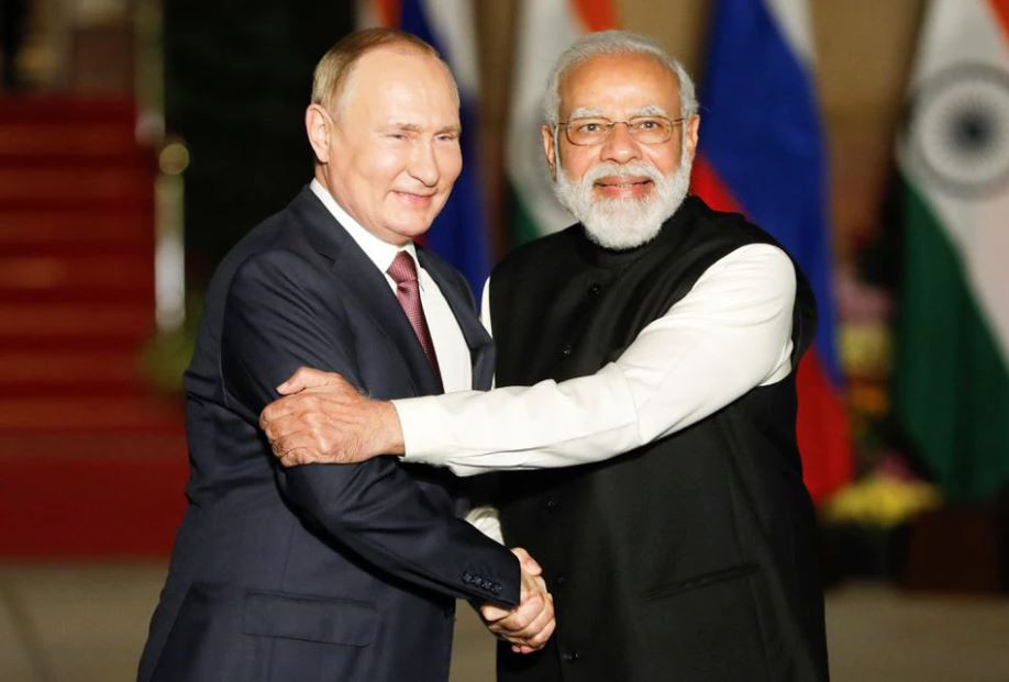 russia s president vladimir putin shakes hands with india s prime minister narendra modi ahead of their meeting at hyderabad house in new delhi india december 6 2021 photo reuters file