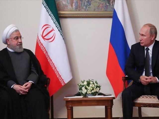 putin and rouhani wished to continue close coordination to achieve longterm peace photo aa